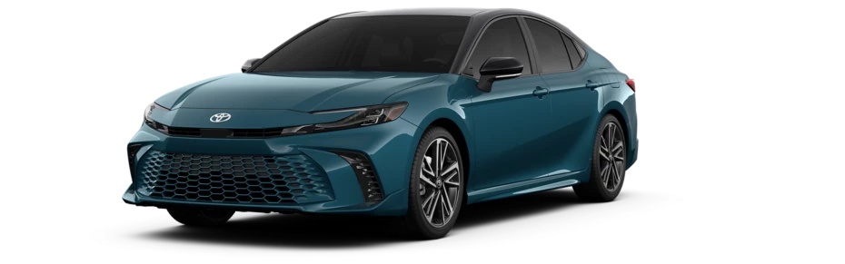 2025 Toyota Camry front view showcasing its bold grille and sleek LED headlights